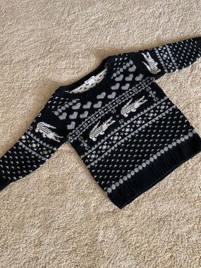 Lacoste sweater with 3/4 sleeves.